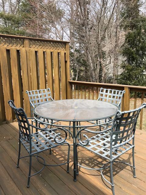 1 North Ridge Road Mashpee, MA 02649 - Photo 16 of 34 a roof deck with chairs and wooden floor
