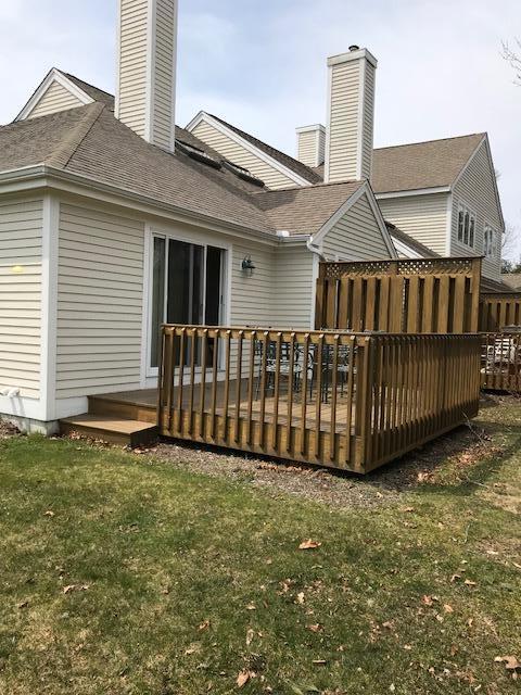 1 North Ridge Road Mashpee, MA 02649 - Photo 23 of 34 a view of a house with a deck