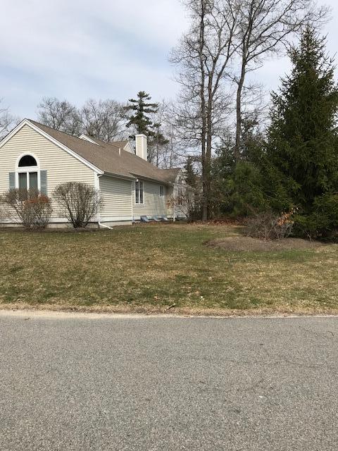 1 North Ridge Road Mashpee, MA 02649 - Photo 24 of 34 a view of a house with a yard