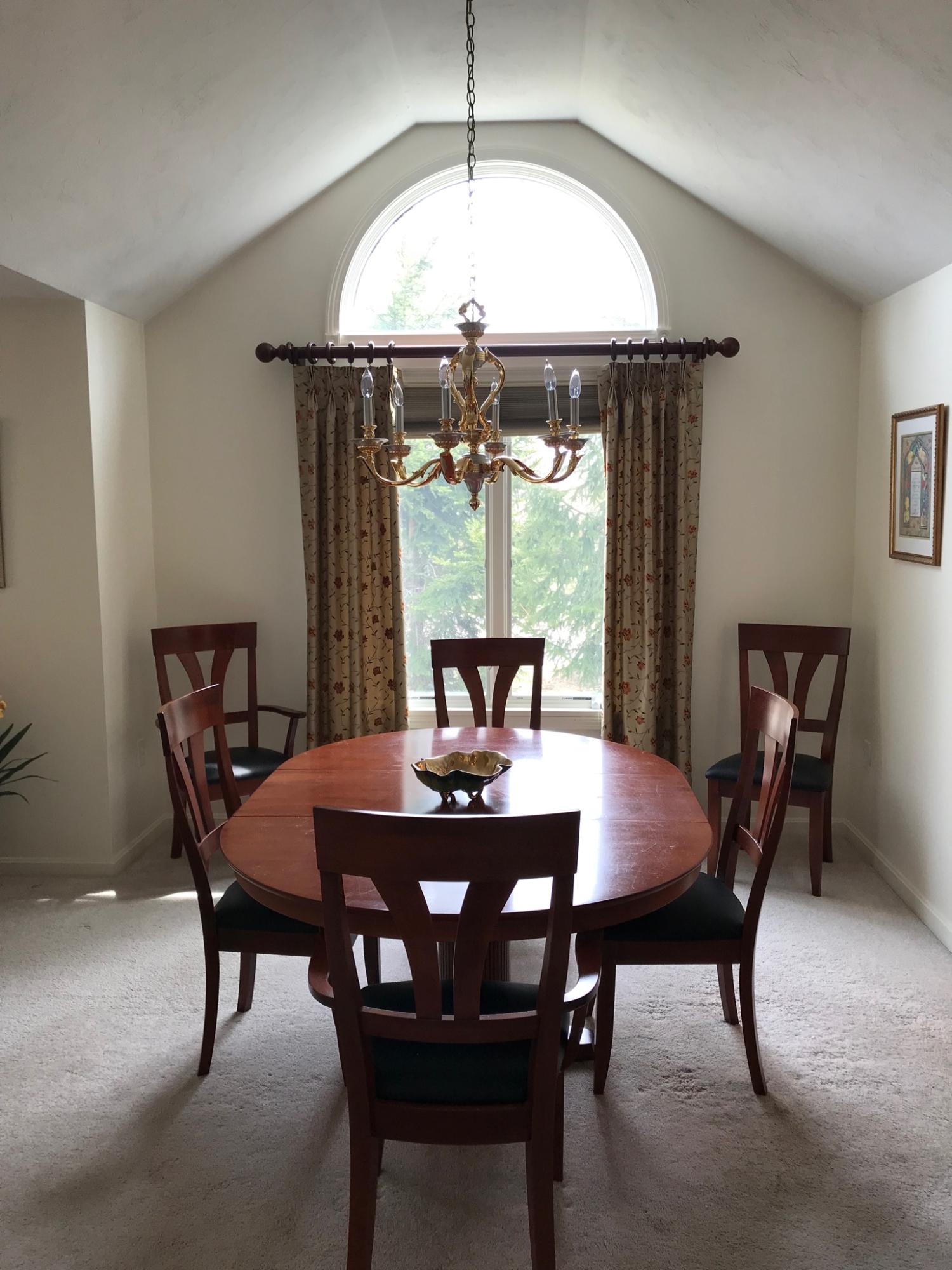 1 North Ridge Road Mashpee, MA 02649 - Photo 7 of 34 a dining room with a table and chairs