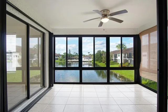 a view of an entryway with a floor to ceiling window