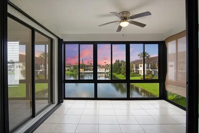 a view of an entryway with a ceiling fan