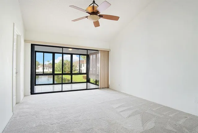 a view of a room with a large window