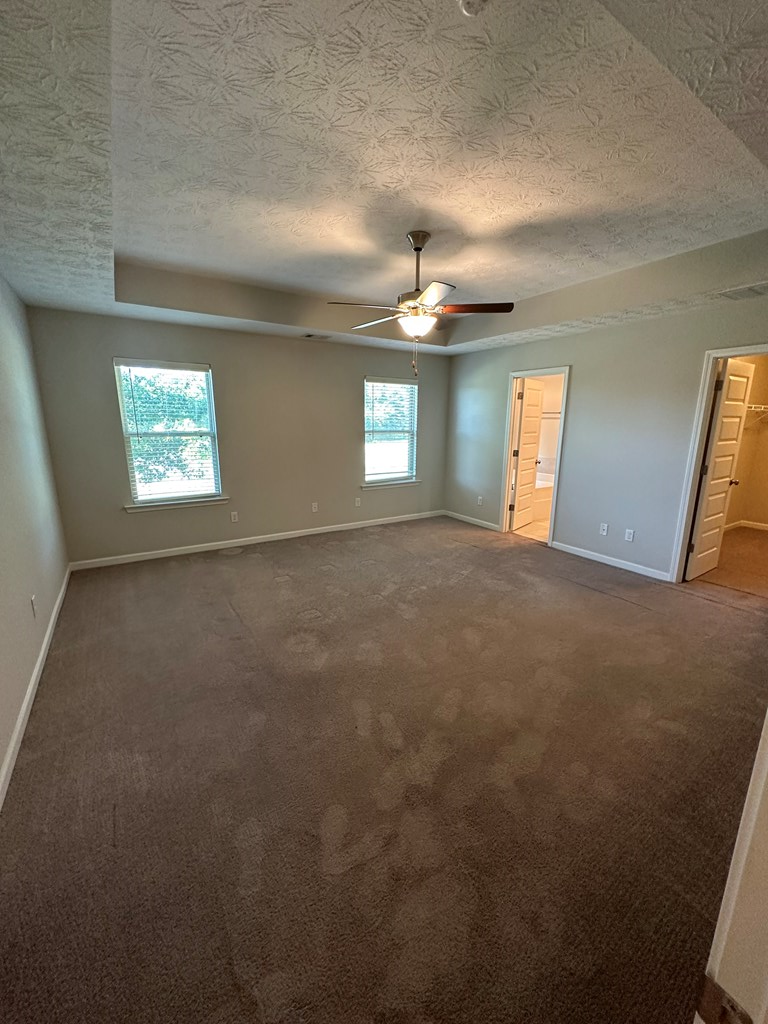 6008 Townes Way Columbus, GA 31909 - Photo 13 of 22 a view of an empty room with windows and fireplace