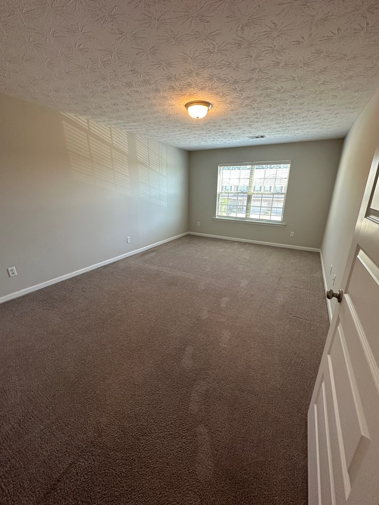 6008 Townes Way Columbus, GA 31909 - Photo 19 of 22 a view of empty room with windows