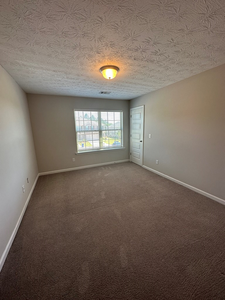 6008 Townes Way Columbus, GA 31909 - Photo 20 of 22 an empty room that has a window
