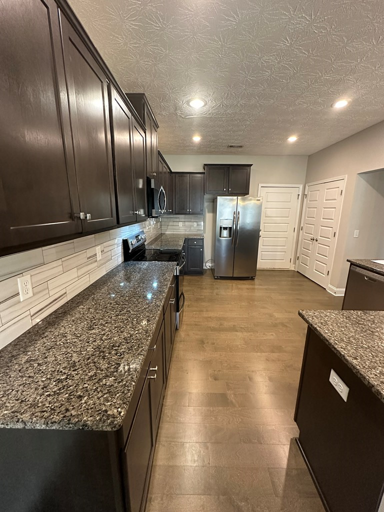 6008 Townes Way Columbus, GA 31909 - Photo 8 of 22 a large kitchen with a counter space