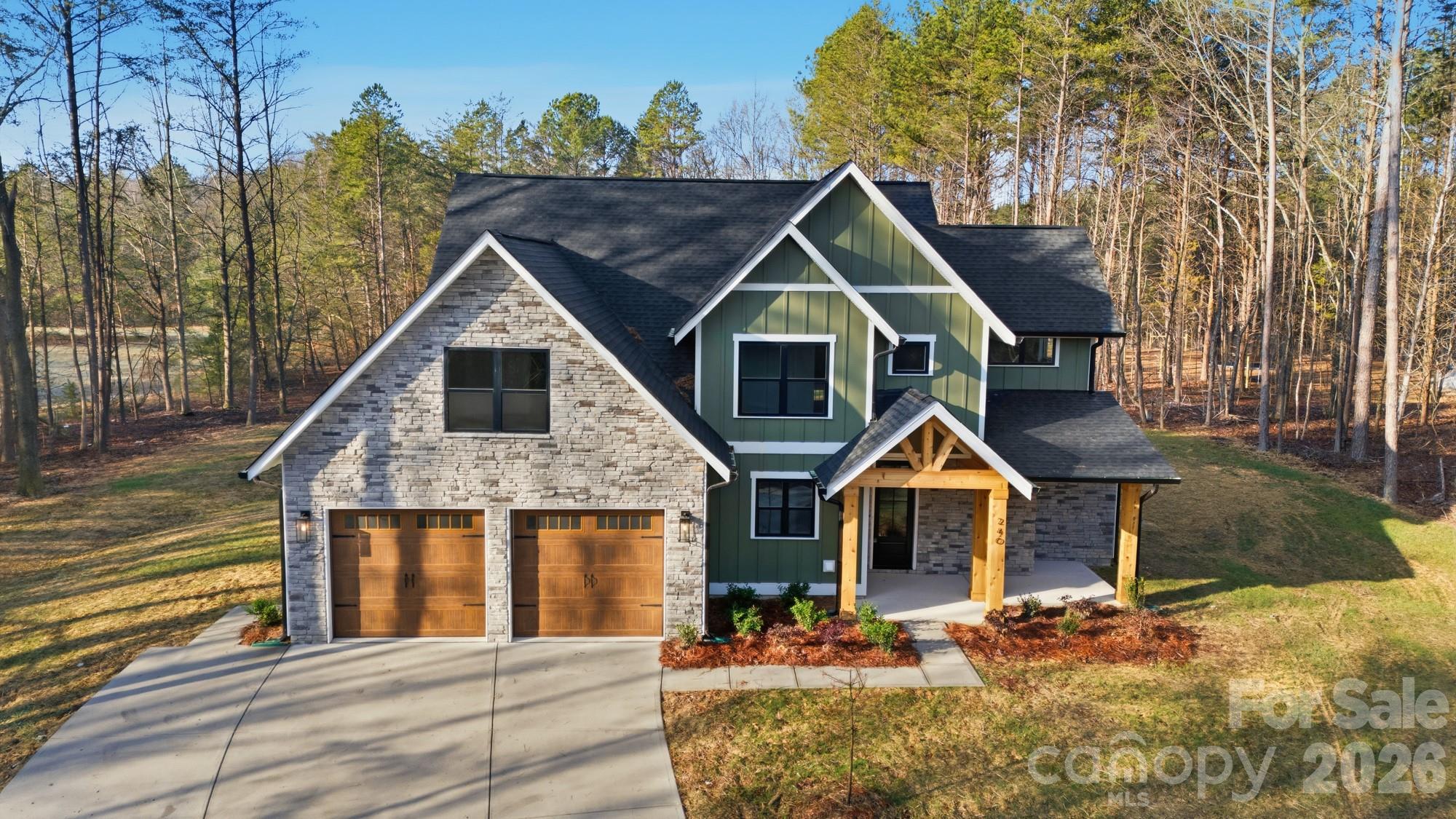 240 Hephzibah Church Road Crouse, NC 28033 - Photo 1 of 48 a front view of a house with wooden fence