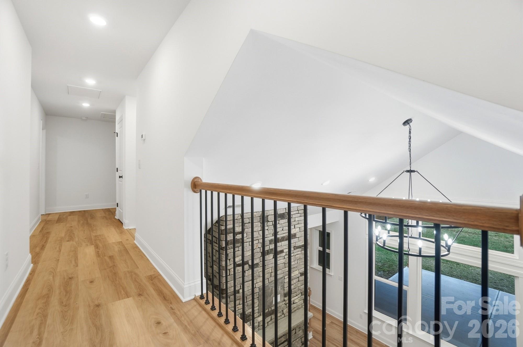 240 Hephzibah Church Road Crouse, NC 28033 - Photo 22 of 48 a view of a hallway with wooden floor