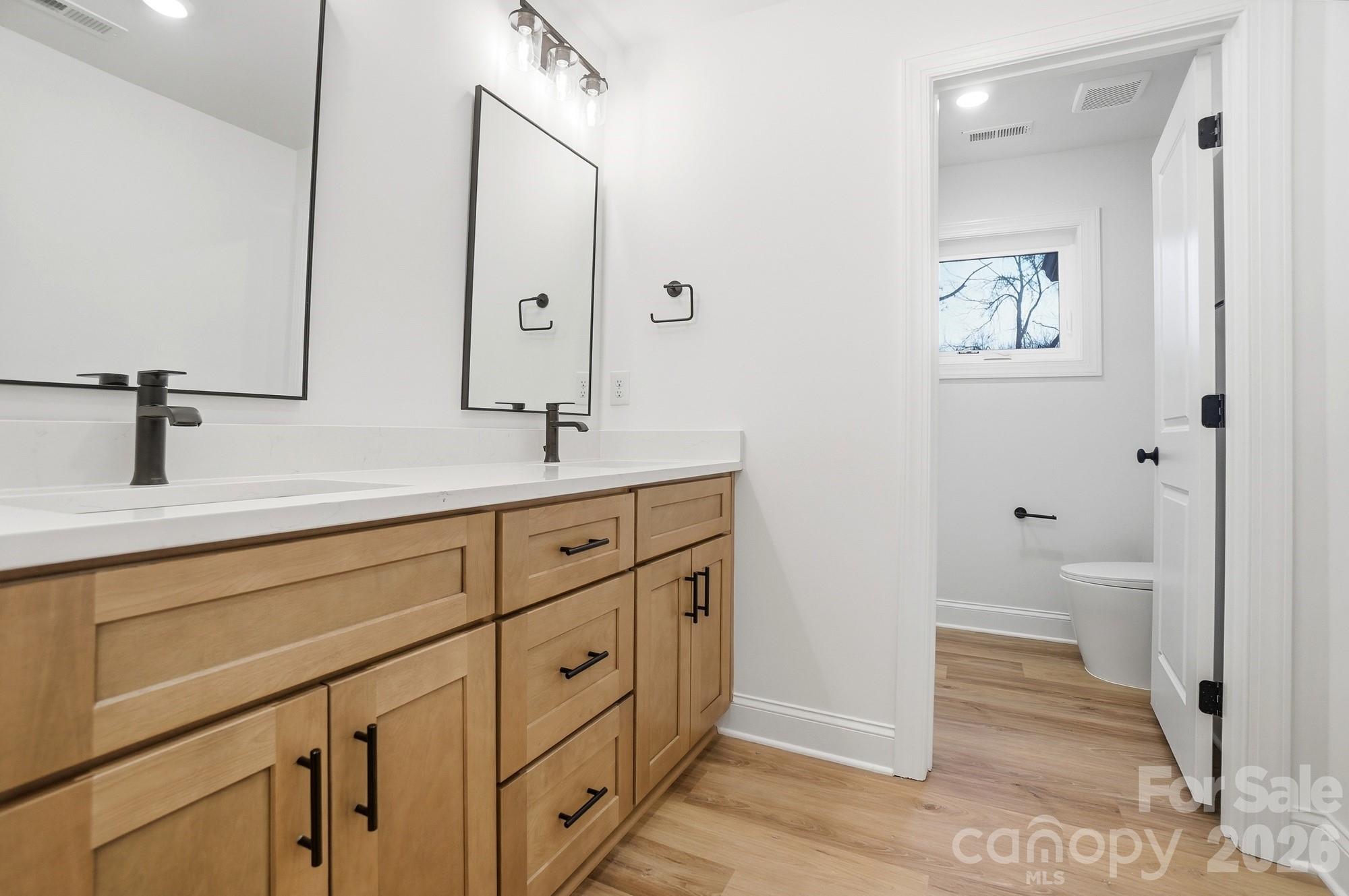 240 Hephzibah Church Road Crouse, NC 28033 - Photo 23 of 48 a bathroom with a sink and a mirror