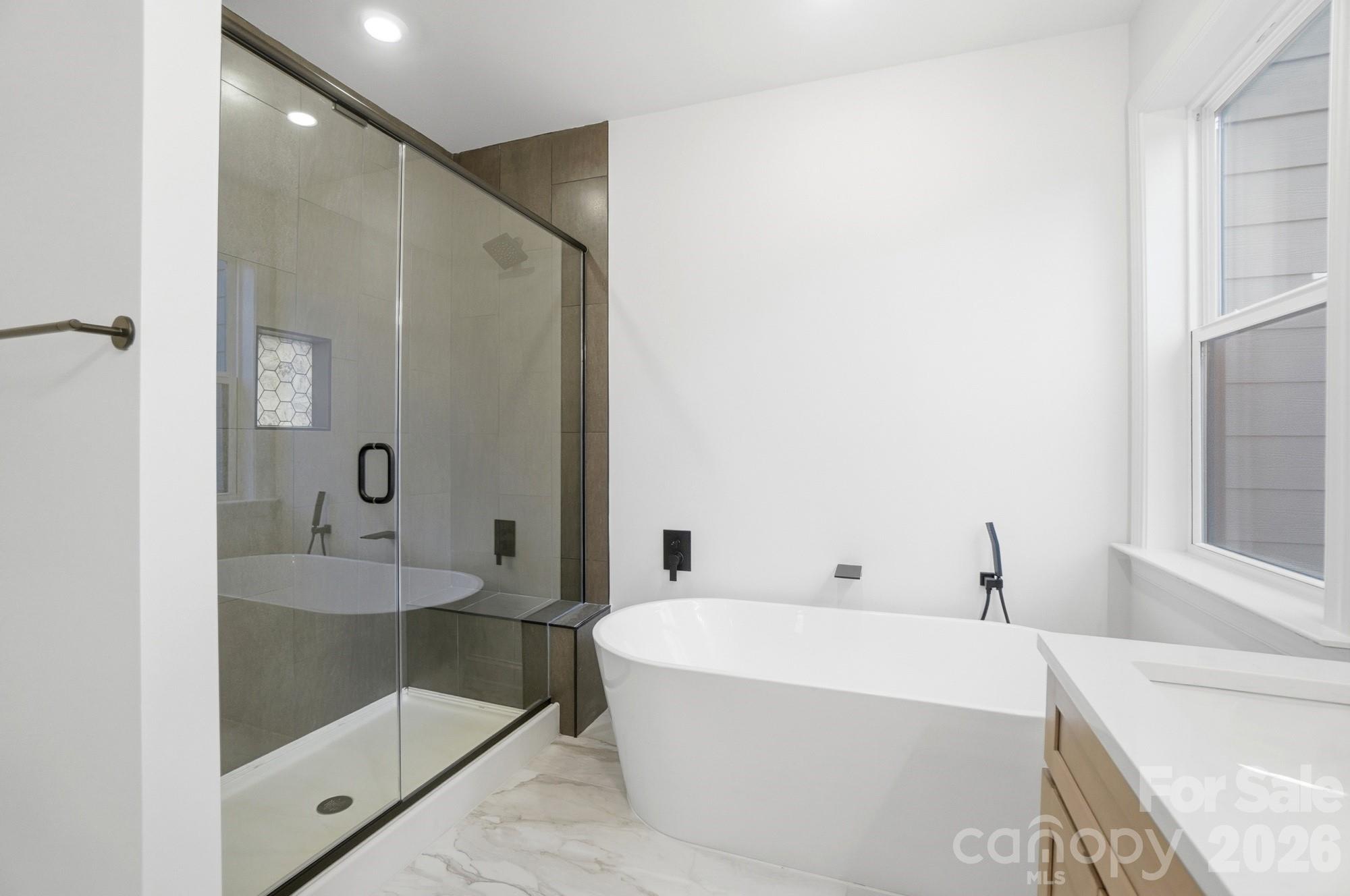 240 Hephzibah Church Road Crouse, NC 28033 - Photo 30 of 48 a bathroom with a bathtub and a sink