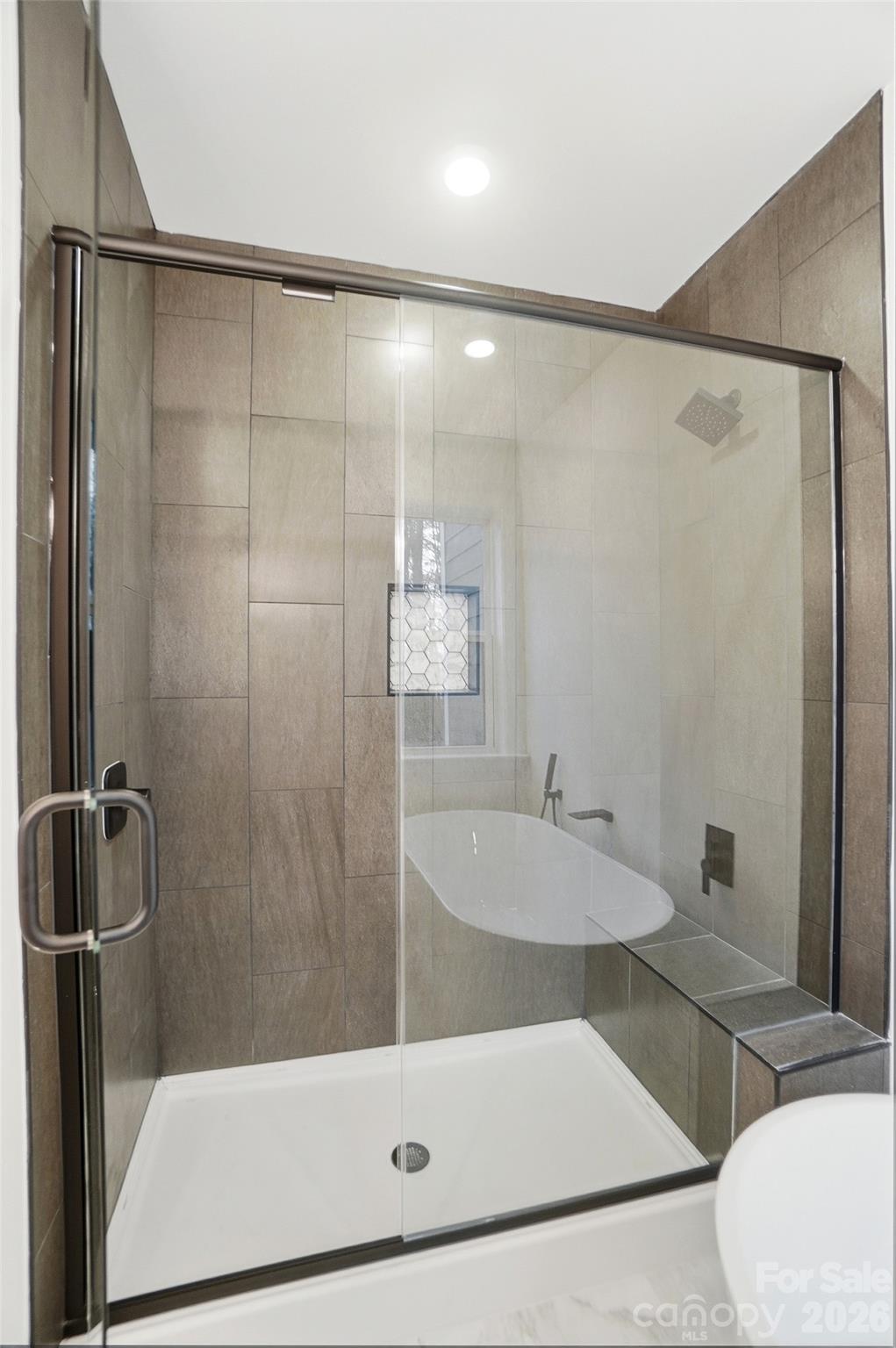 240 Hephzibah Church Road Crouse, NC 28033 - Photo 33 of 48 a bathroom with a shower and a sink