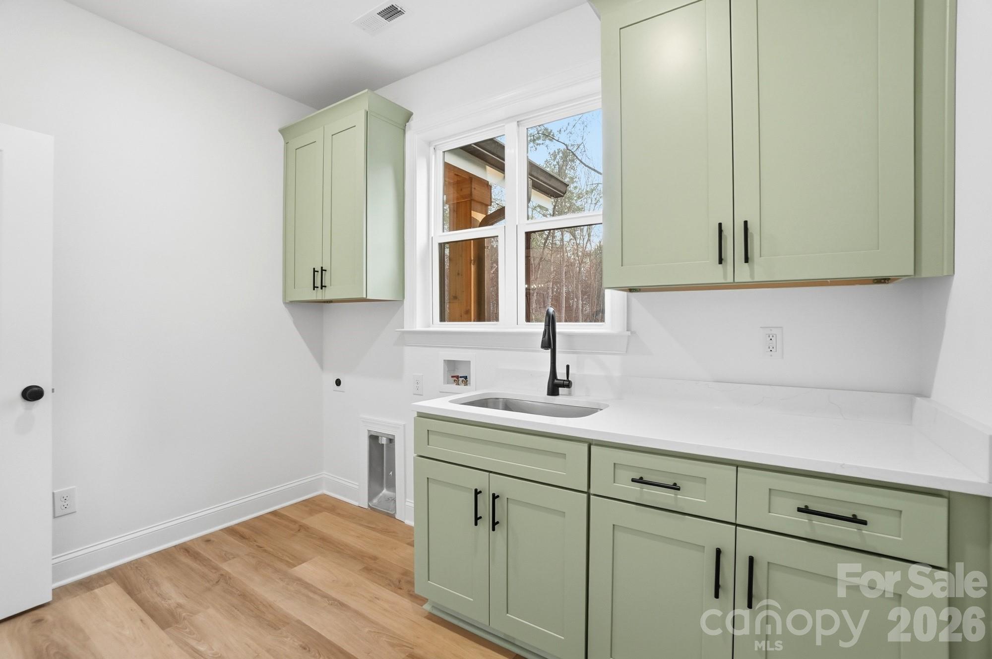 240 Hephzibah Church Road Crouse, NC 28033 - Photo 34 of 48 a bathroom with a sink and a mirror