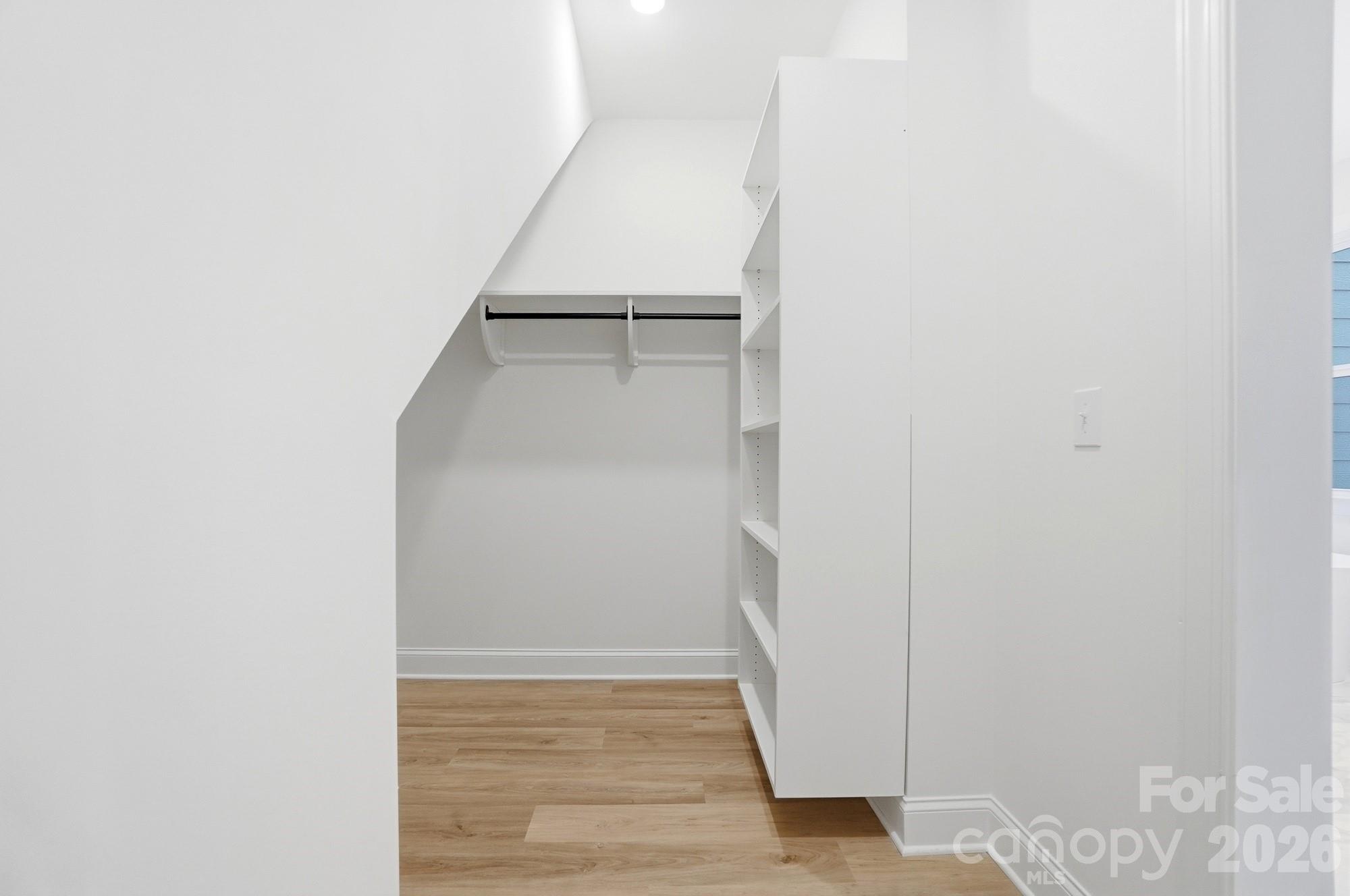 240 Hephzibah Church Road Crouse, NC 28033 - Photo 40 of 48 a view of walk in closet with empty racks
