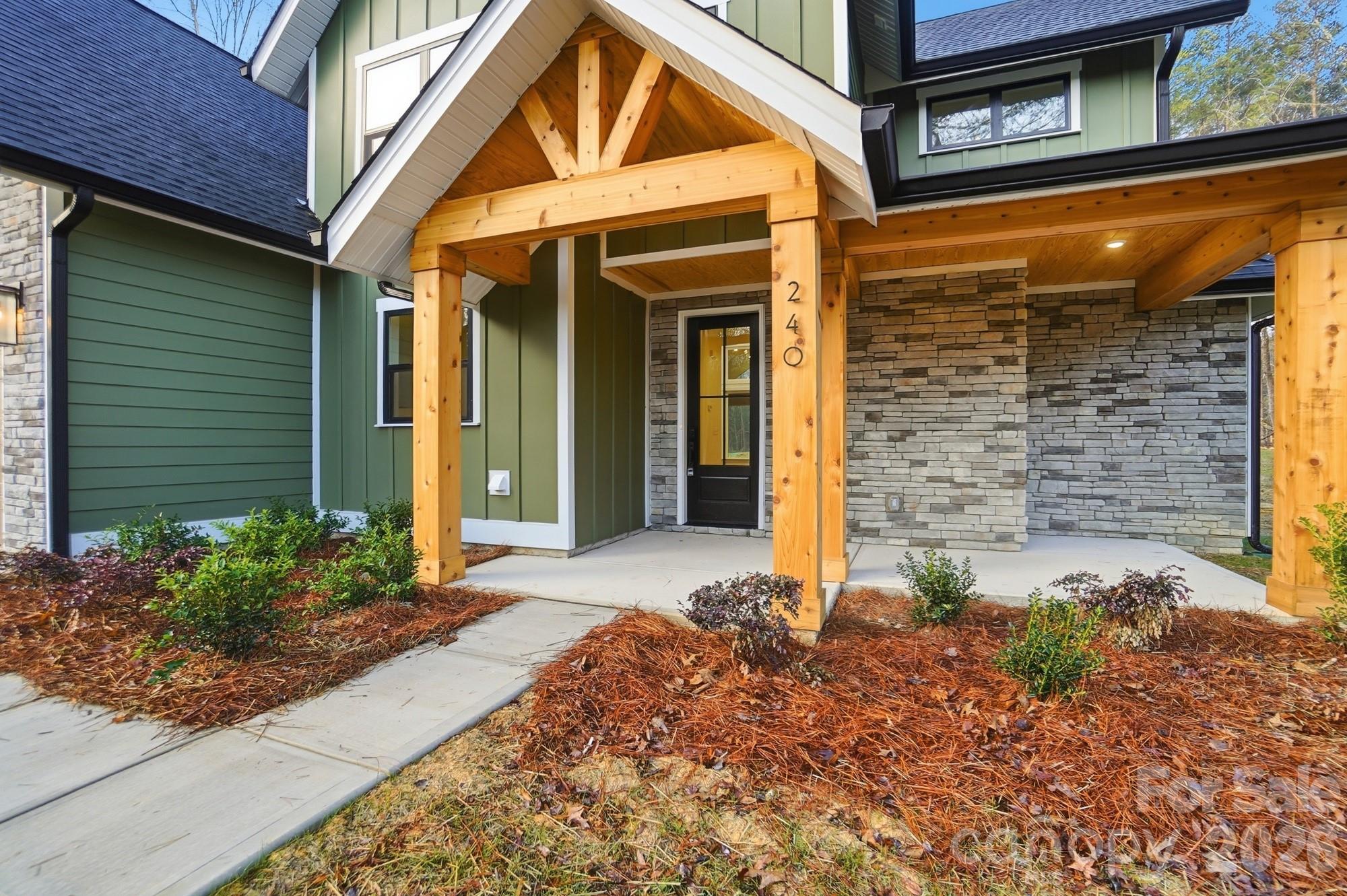 240 Hephzibah Church Road Crouse, NC 28033 - Photo 4 of 48 a front view of a house with a yard