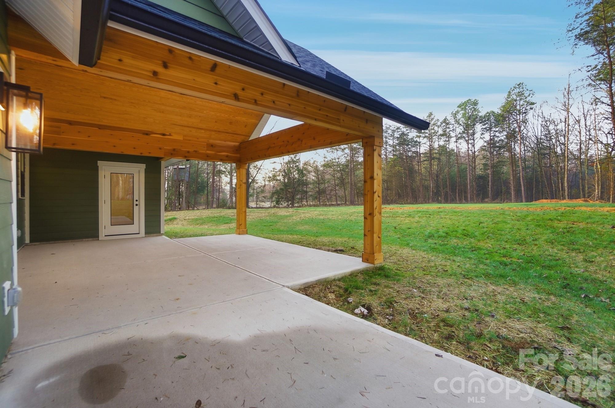 240 Hephzibah Church Road Crouse, NC 28033 - Photo 43 of 48 a view of a house with backyard and porch