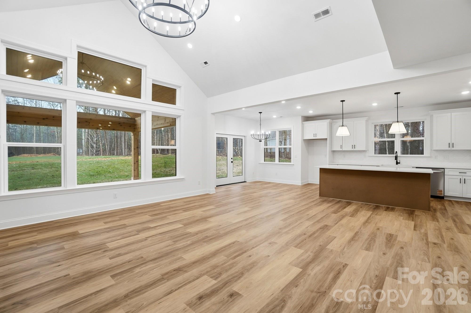 240 Hephzibah Church Road Crouse, NC 28033 - Photo 10 of 48 a view of kitchen with wooden floor and windows