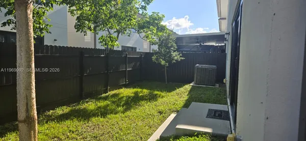 a bathroom with a toilet a sink and shower