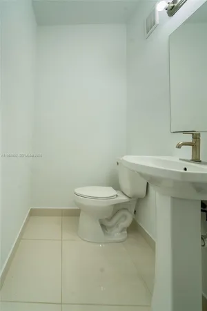 a view of a bathroom with a shower and a toilet