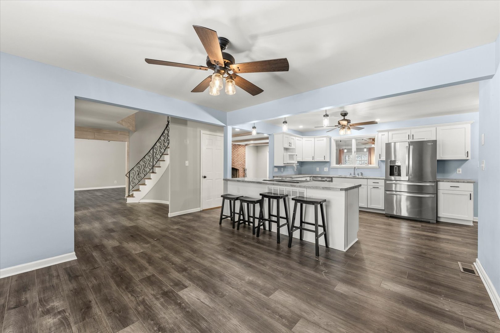 142 Lake Road Seymour, IL 61875 - Photo 11 of 49 a view of kitchen with sink microwave and refrigerator