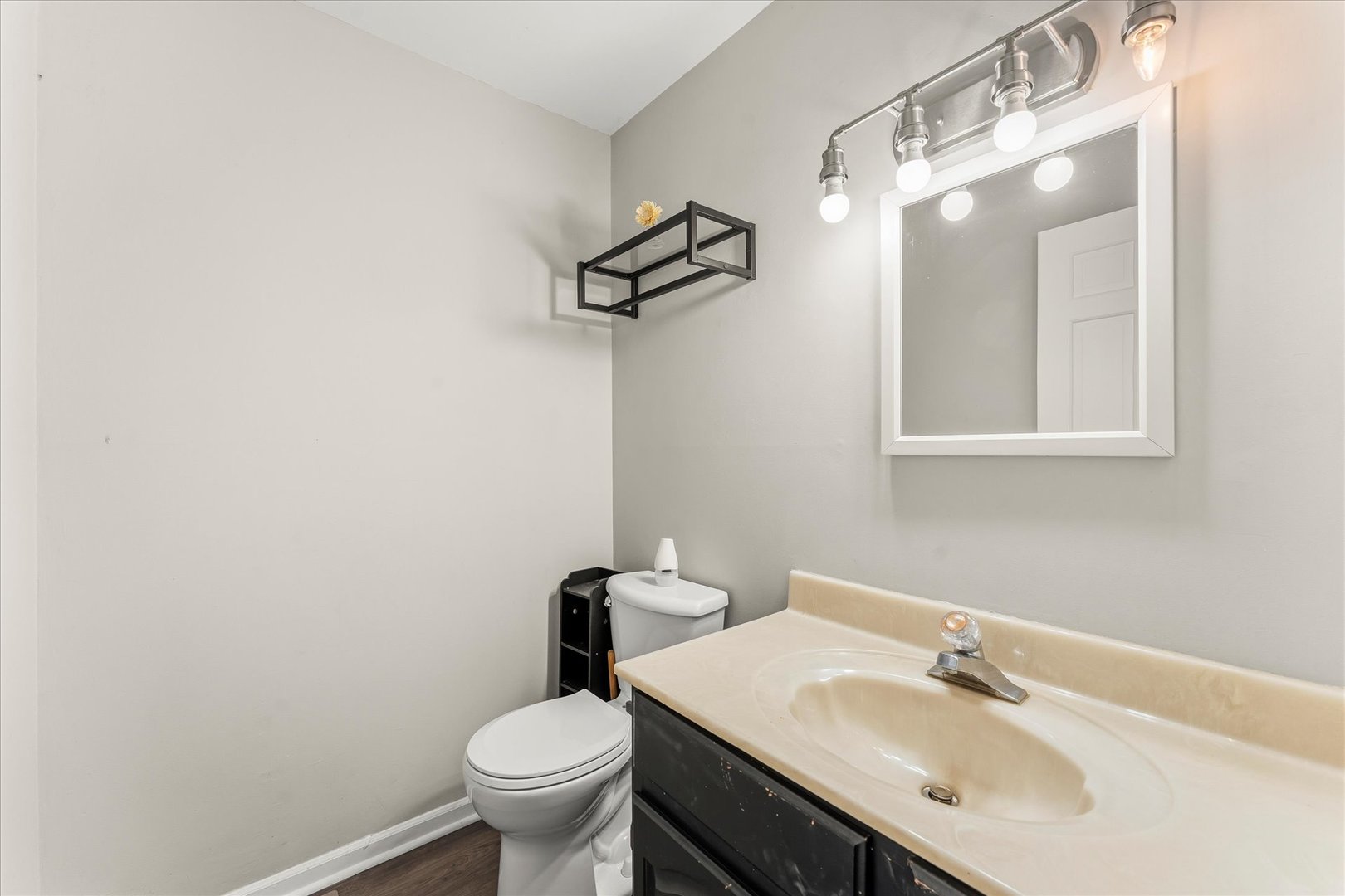 142 Lake Road Seymour, IL 61875 - Photo 20 of 49 a bathroom with a sink toilet and a mirror