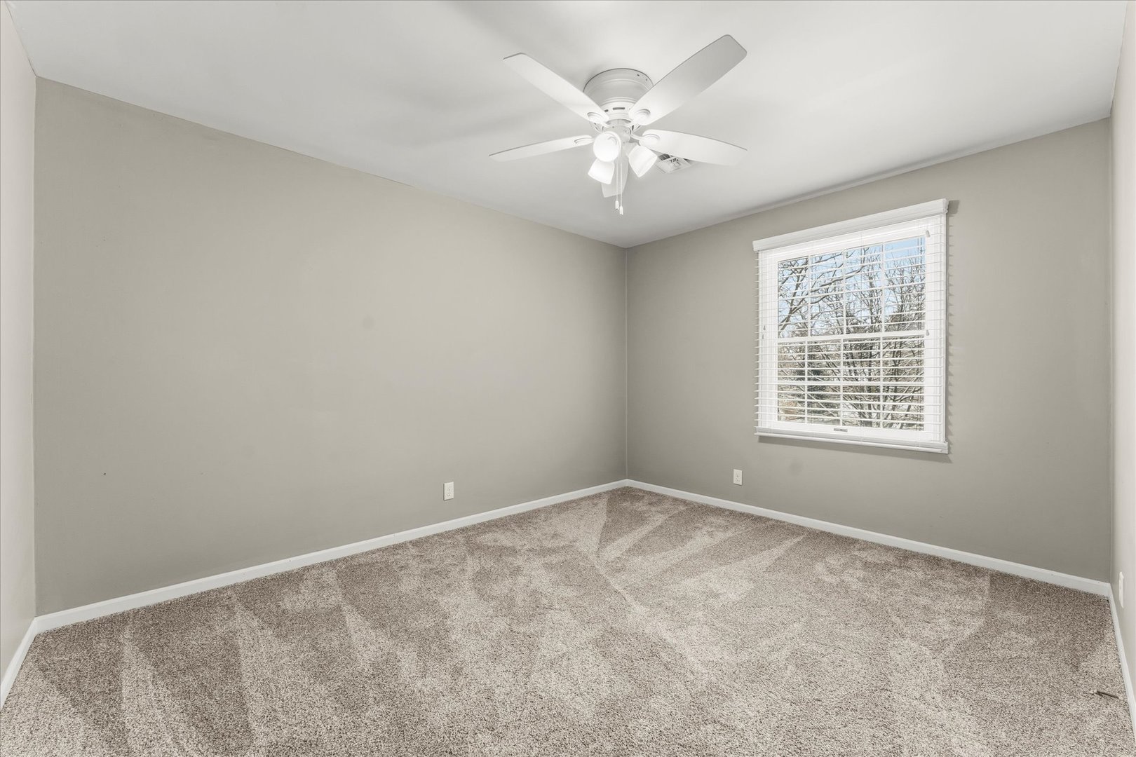 142 Lake Road Seymour, IL 61875 - Photo 23 of 49 a view of an empty room with a window