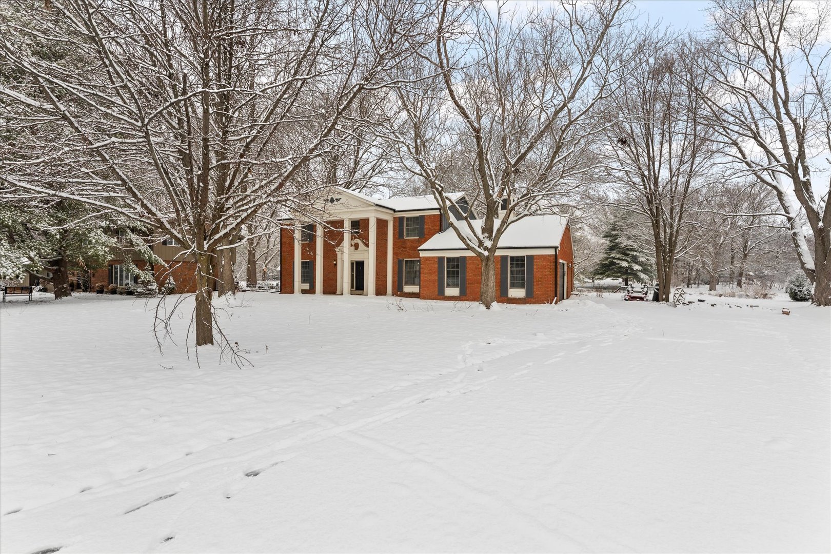 142 Lake Road Seymour, IL 61875 - Photo 43 of 49 a view of house with a yard covered in snow