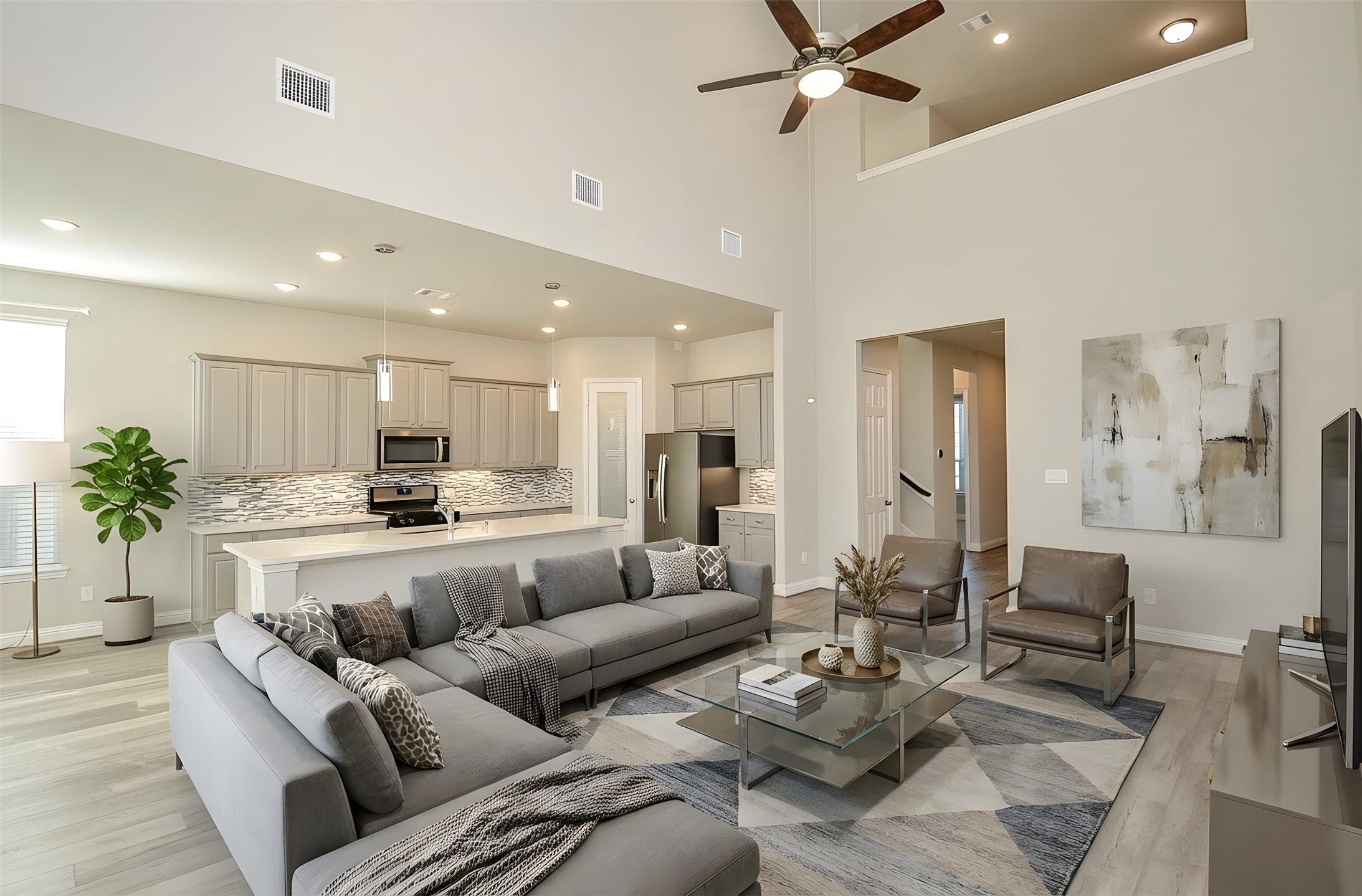 338 Summer Landing Court Rosenberg, TX 77469 - Photo 21 of 50 a living room with furniture kitchen view and a chandelier