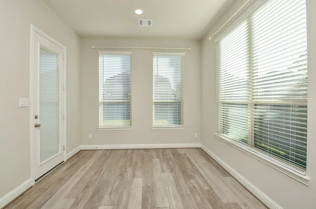 an empty room with a window