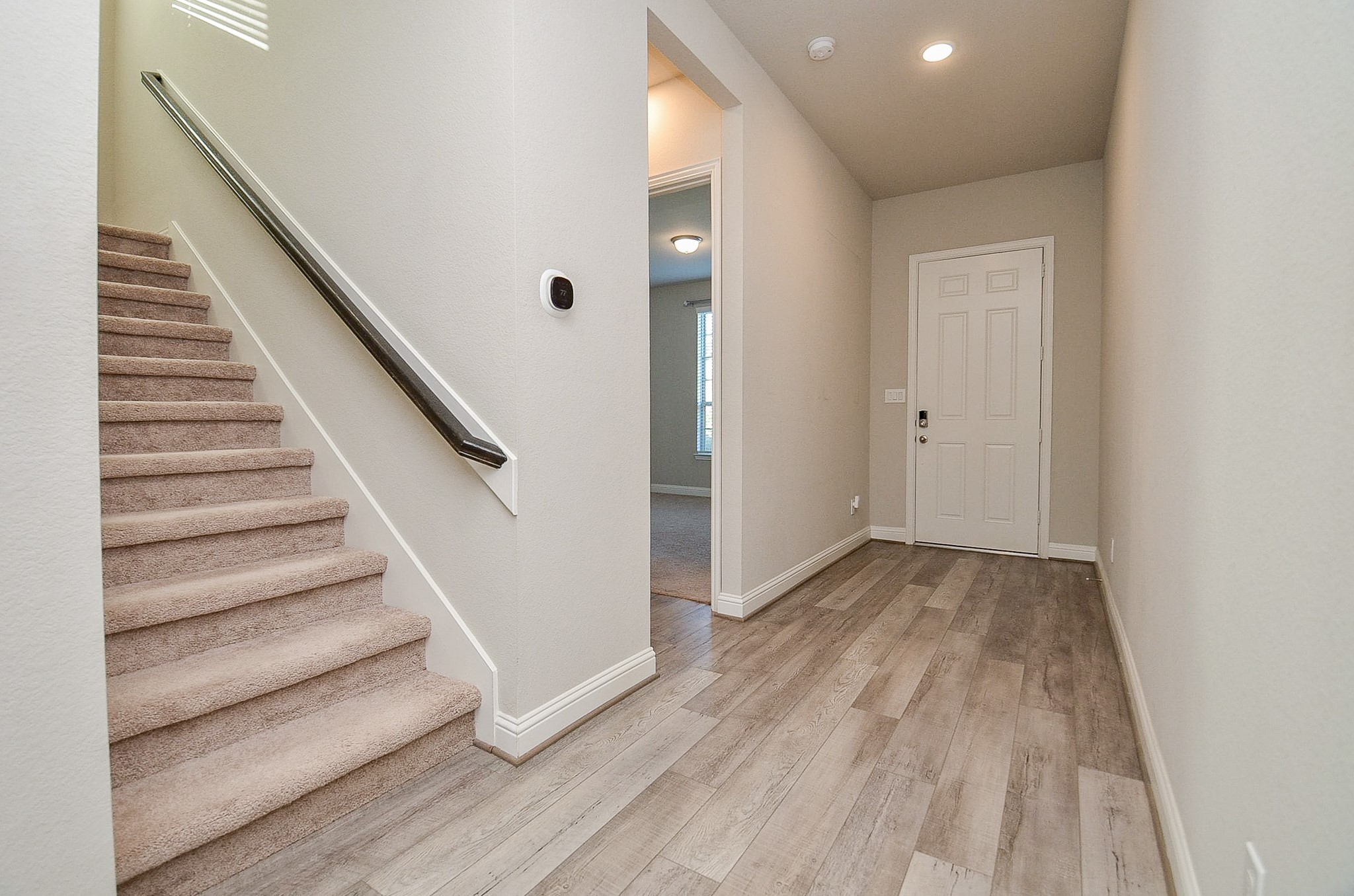 338 Summer Landing Court Rosenberg, TX 77469 - Photo 3 of 50 a view of entryway with wooden floor