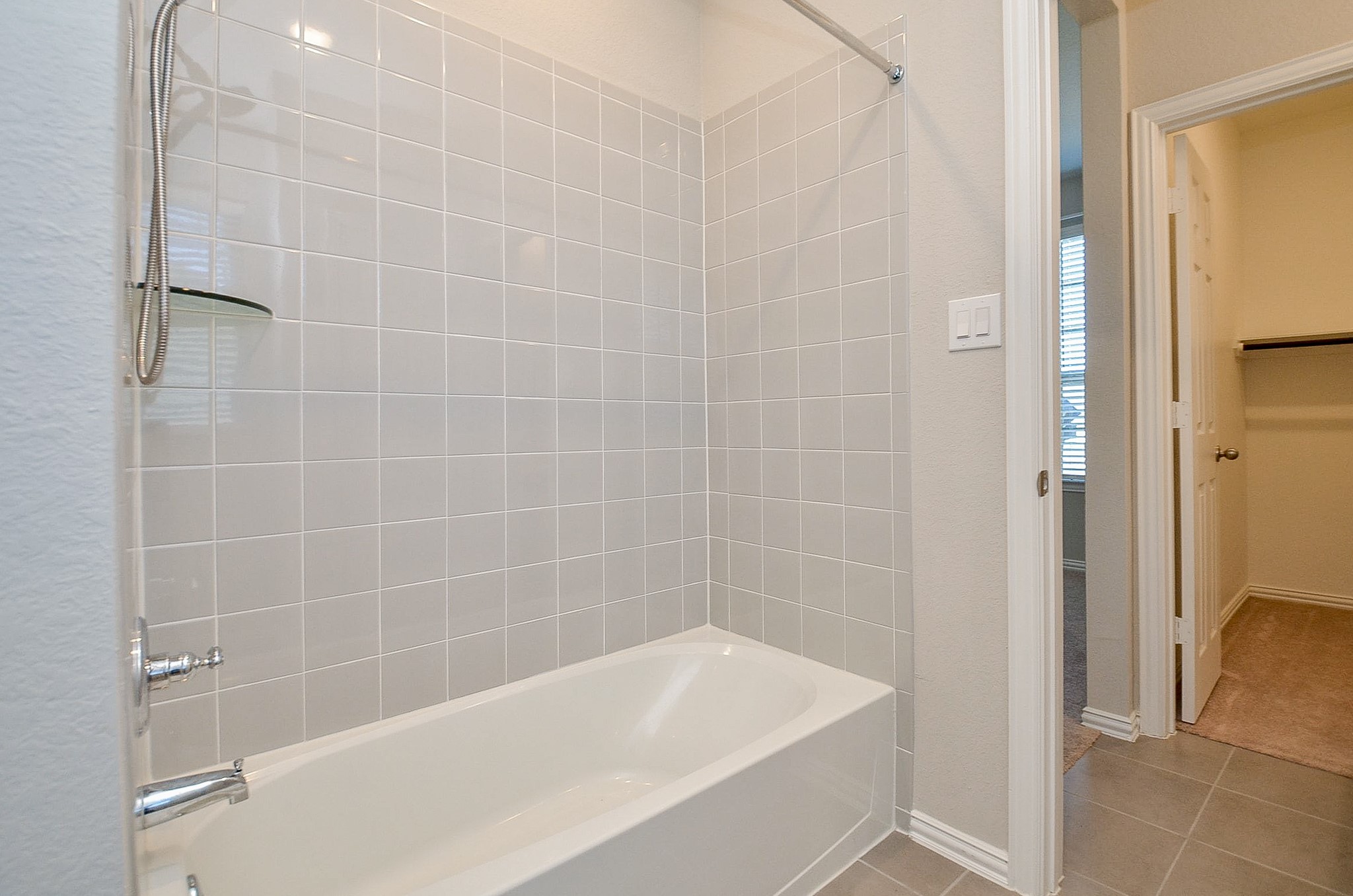 338 Summer Landing Court Rosenberg, TX 77469 - Photo 38 of 50 a bath tub sitting next to a white sink