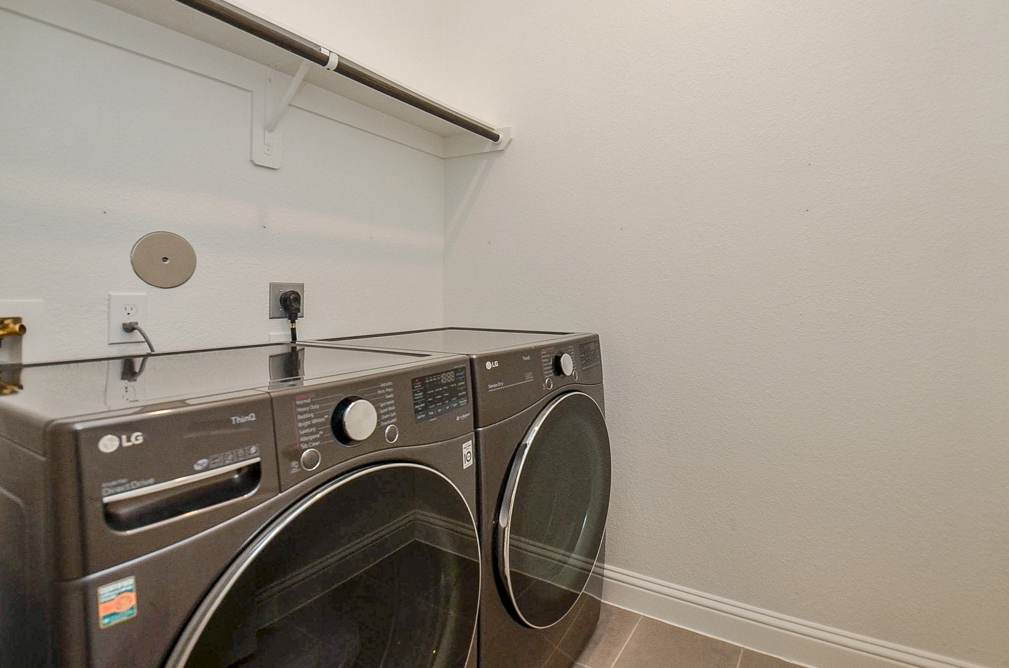 338 Summer Landing Court Rosenberg, TX 77469 - Photo 47 of 50 a utility room with dryer and washer