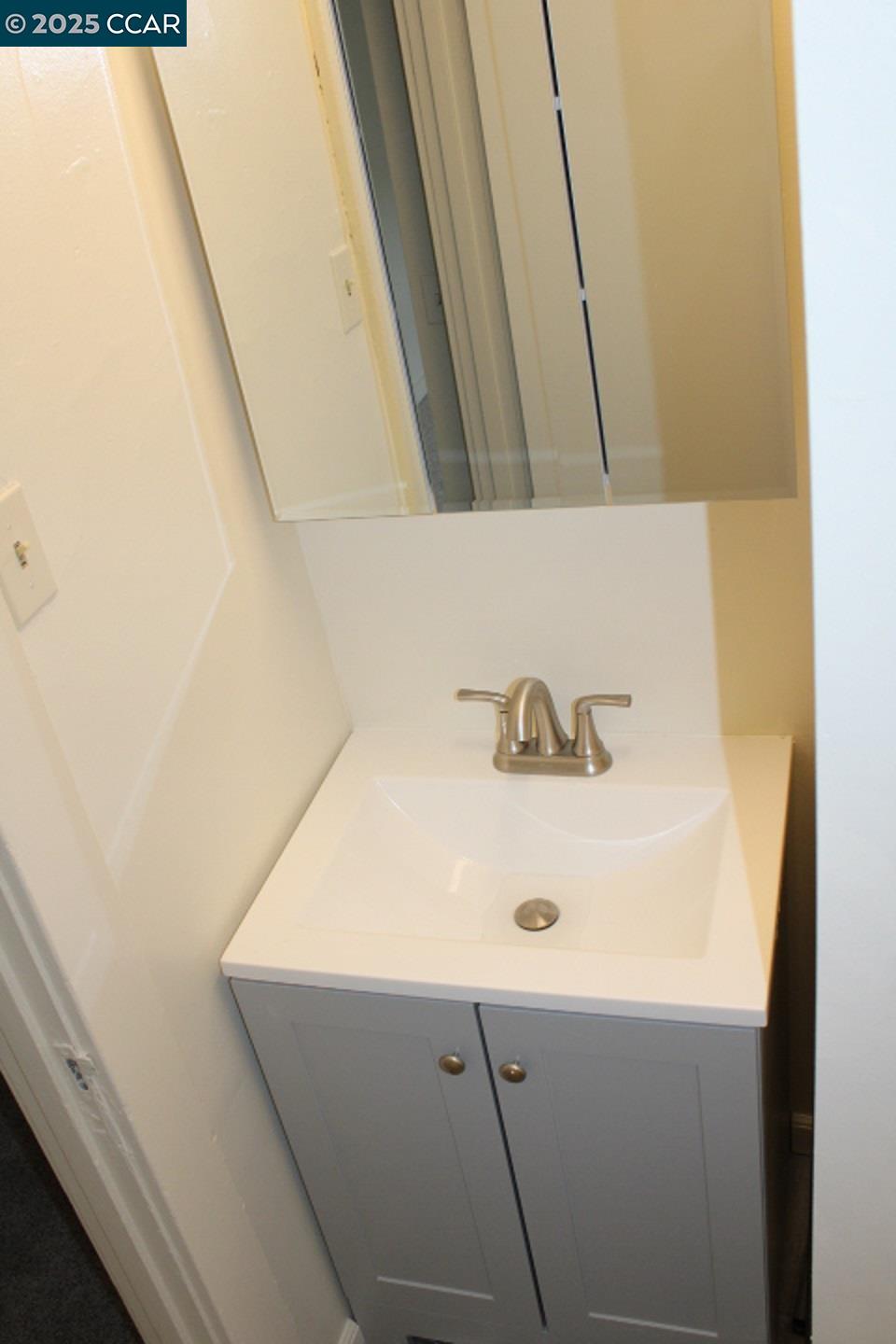 5918 Alameda Avenue, Unit 5918 Richmond, CA 94804 - Photo 11 of 16 a bathroom with a sink and a tub