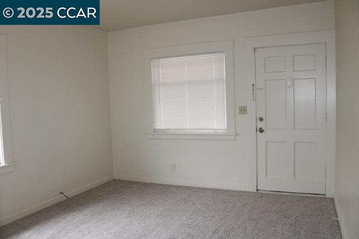 5918 Alameda Avenue, Unit 5918 Richmond, CA 94804 - Photo 2 of 16 an empty room with a window