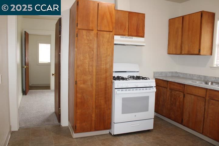 5918 Alameda Avenue, Unit 5918 Richmond, CA 94804 - Photo 6 of 16 a room with storage and utility