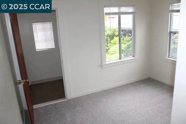 a view of a room that has a window