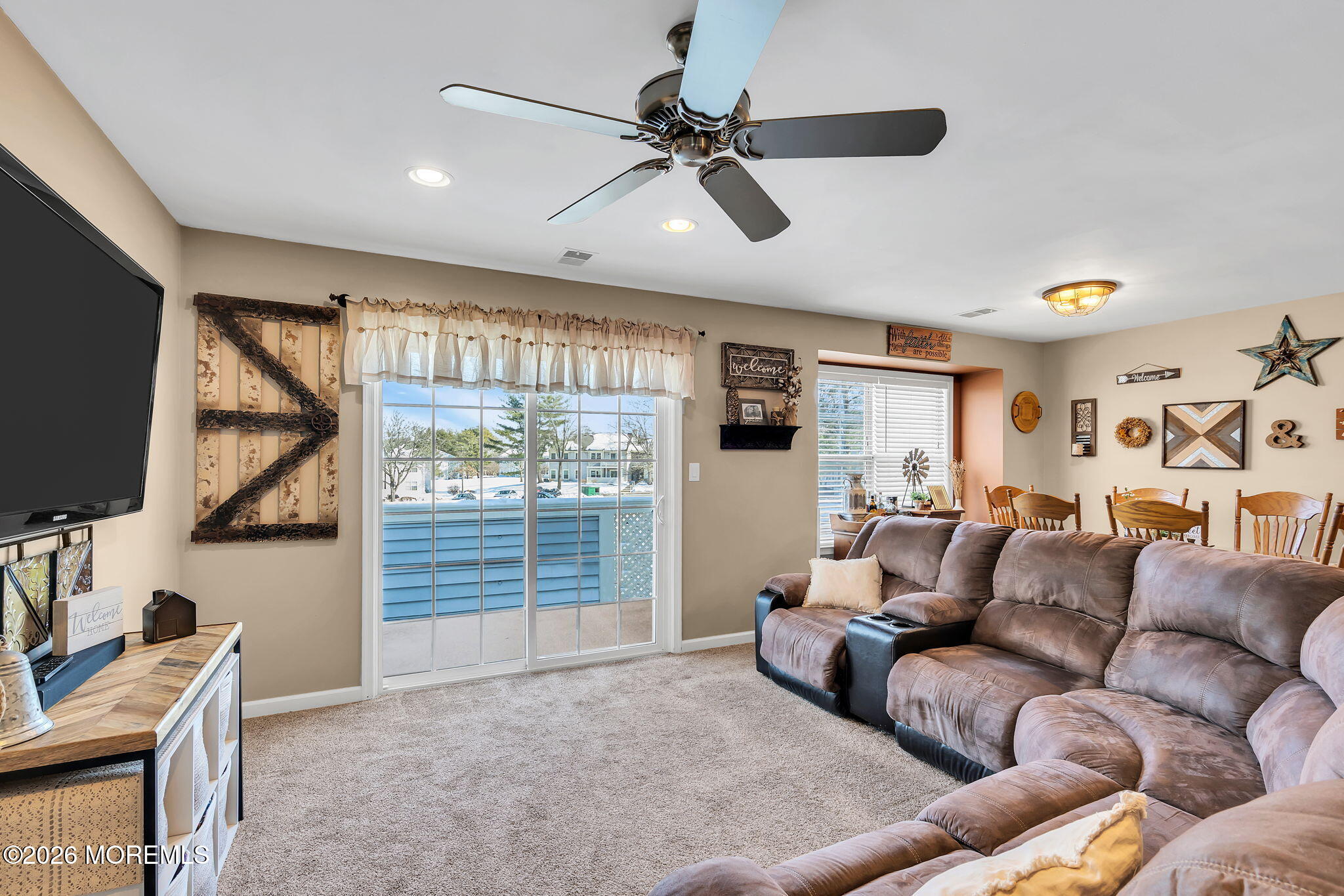 402 Brookview Court Howell, NJ 07731 - Photo 12 of 22 a living room with furniture and a flat screen tv