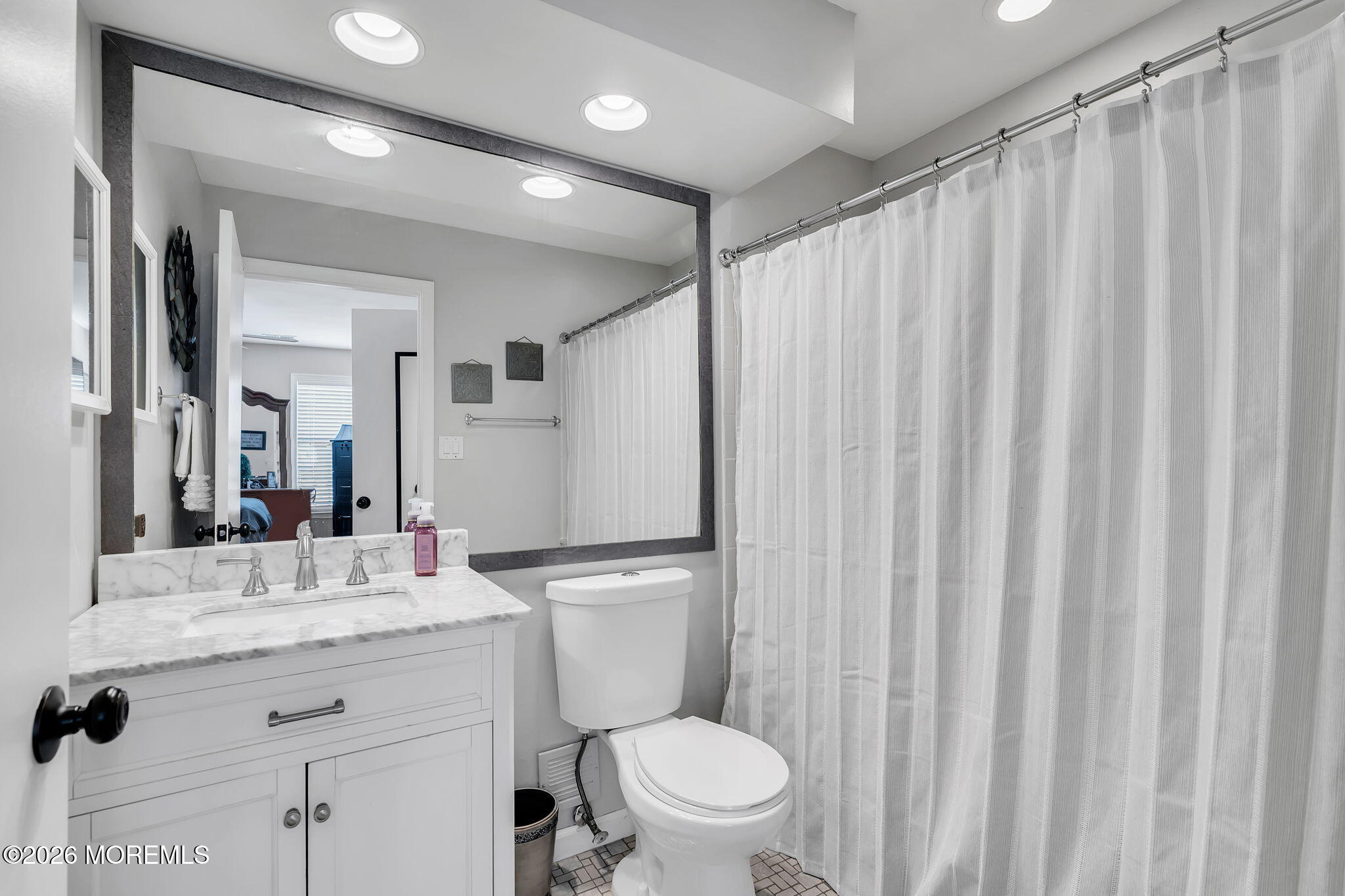 402 Brookview Court Howell, NJ 07731 - Photo 17 of 22 a bathroom with a granite countertop sink toilet and shower