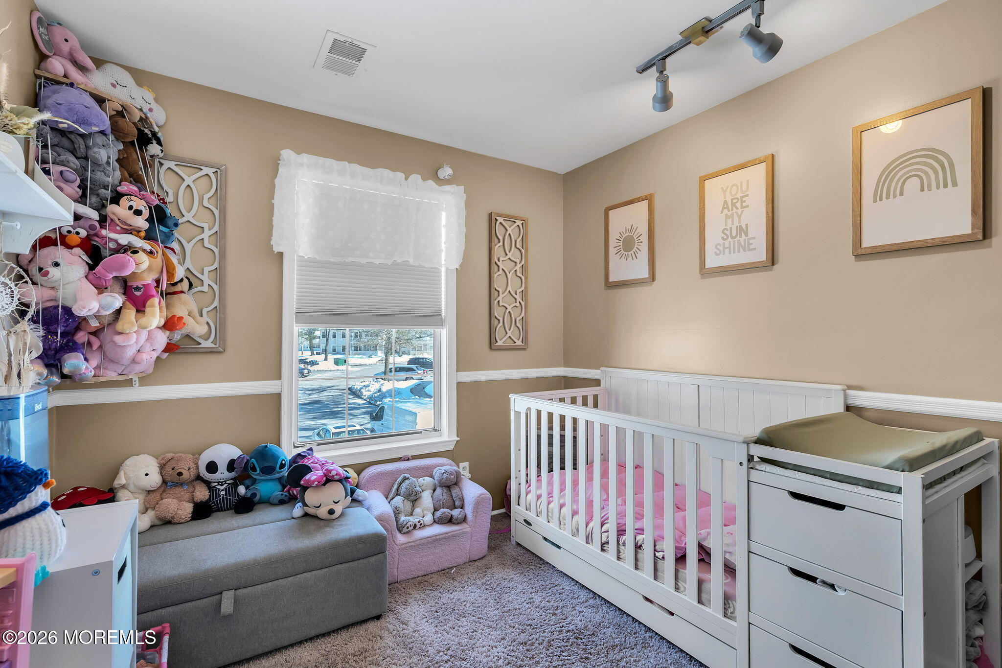 402 Brookview Court Howell, NJ 07731 - Photo 18 of 22 a bedroom with baby bed and a window