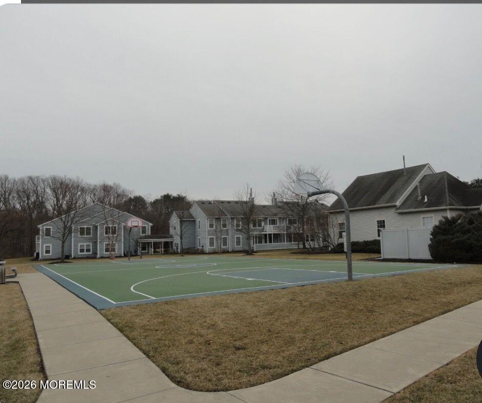 402 Brookview Court Howell, NJ 07731 - Photo 22 of 22 a view of a big house with a big yard and large trees