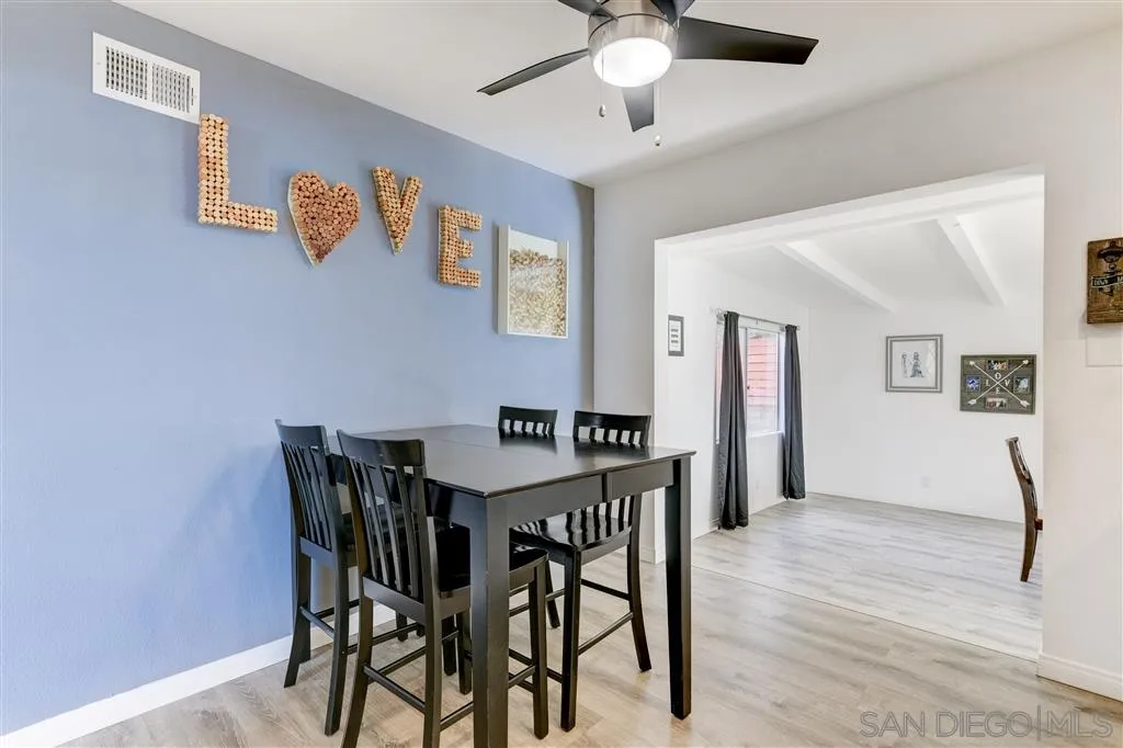 1985 La Cresta Road El Cajon, CA 92021 - Photo 15 of 25 a view of a dining room with furniture and wooden floor