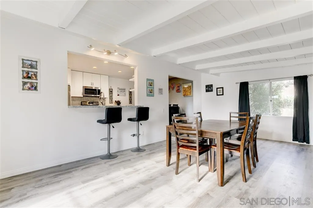 1985 La Cresta Road El Cajon, CA 92021 - Photo 3 of 25 a view of a dining room with furniture and a potted plant