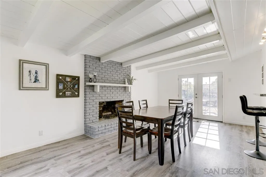 1985 La Cresta Road El Cajon, CA 92021 - Photo 5 of 25 a view of a dining room with furniture and wooden floor