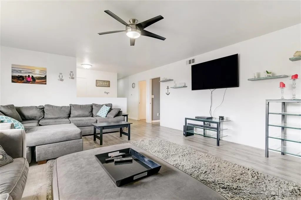 1985 La Cresta Road El Cajon, CA 92021 - Photo 8 of 25 a living room with furniture and a flat screen tv
