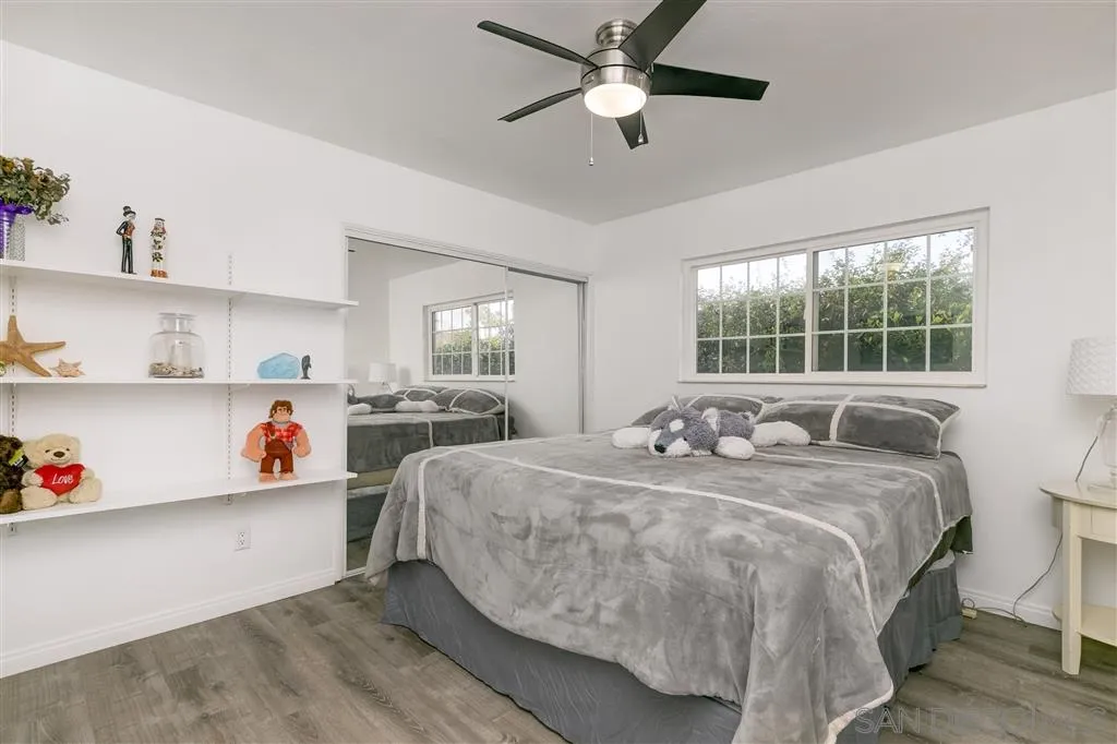 1985 La Cresta Road El Cajon, CA 92021 - Photo 9 of 25 a bed room with a bed and window