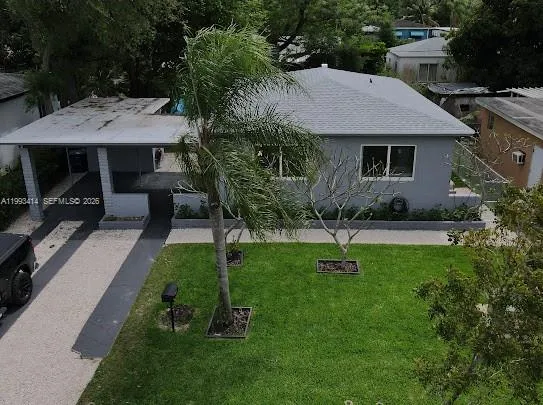 a aerial view of a house with garden