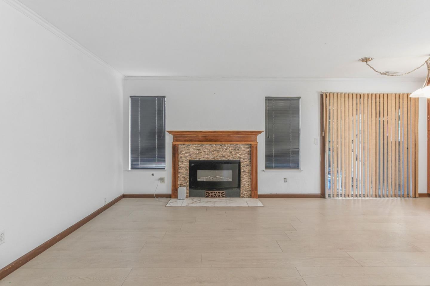 2678 Ramsdell Place San Jose, CA 95148 - Photo 13 of 41 a view of empty room with a fireplace