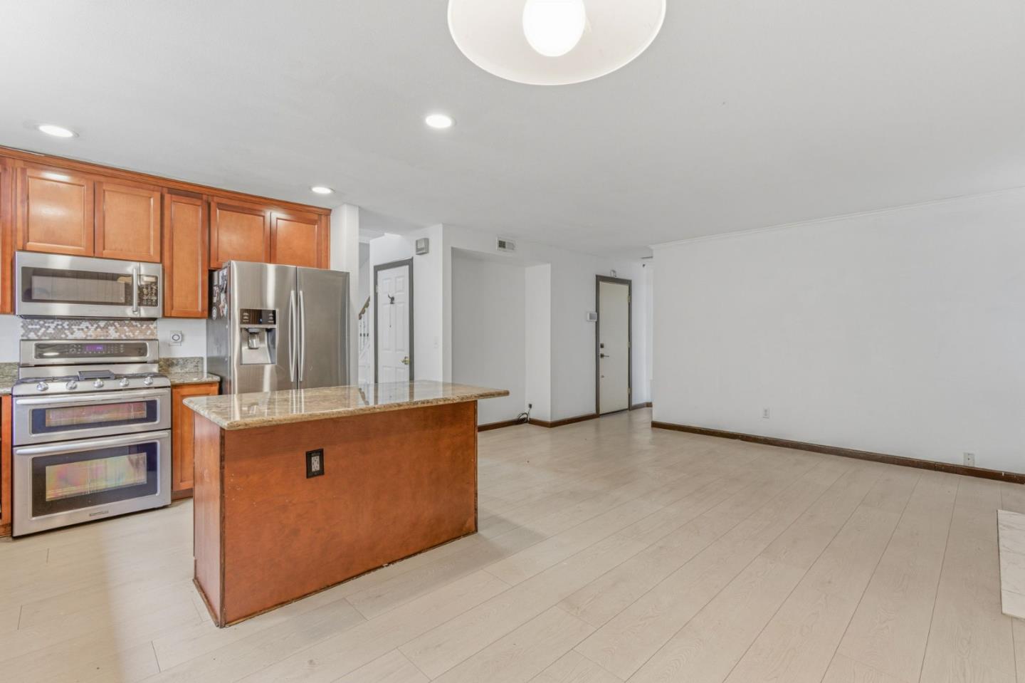 2678 Ramsdell Place San Jose, CA 95148 - Photo 20 of 41 a kitchen with stainless steel appliances a refrigerator and stove