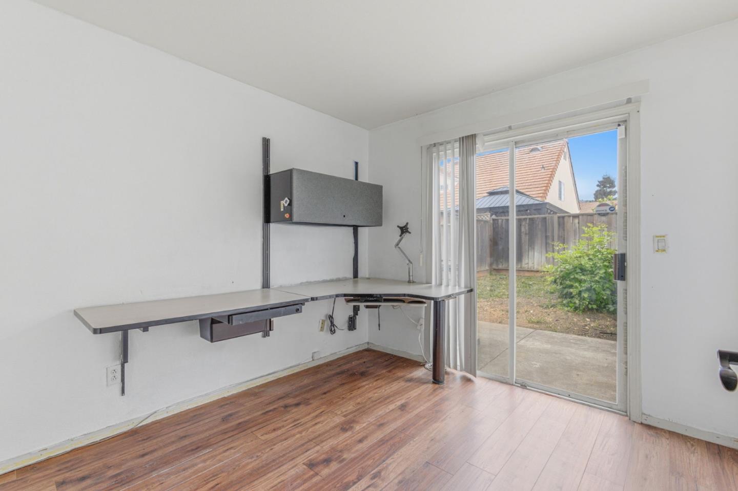 2678 Ramsdell Place San Jose, CA 95148 - Photo 26 of 41 a view of a kitchen with wooden floor and electronic appliances