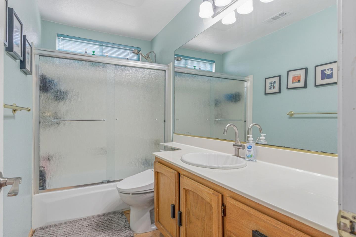 2678 Ramsdell Place San Jose, CA 95148 - Photo 37 of 41 a bathroom with a sink a toilet and shower